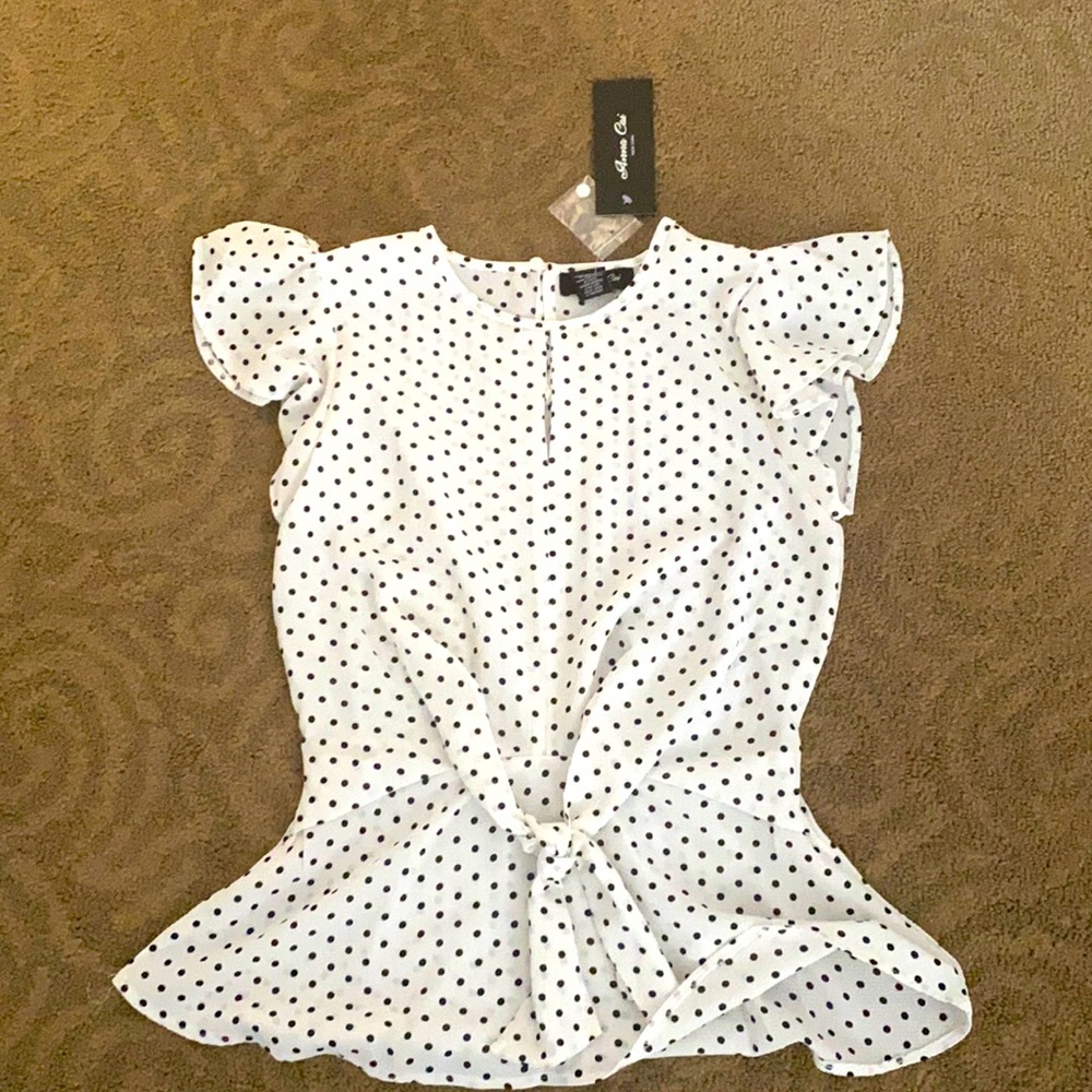 White polka dot top